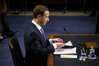 Mark Zuckerberg, chief executive officer and founder of Facebook Inc., goes over notes during a joint hearing of the Senate Judiciary and Commerce Committees in Washington, D.C., U.S., on Tuesday, April 10, 2018. Al Drago / Bloomberg
