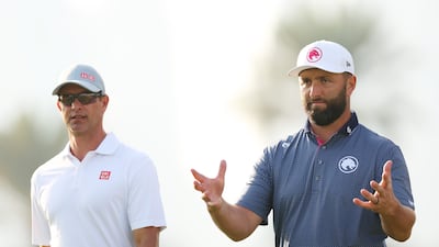Adam Scott and Jon Rahm, right, during the opening round of the Hero Dubai Desert Classic at Emirates Golf Club on Thursday, January 16, 2025. Getty Images