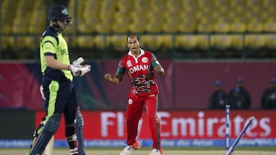 Ireland’s Kevin O’Brien is bowled out by Oman’s Munis Ansari during the ICC World T20 2016 cricket tournament at the Himachal Pradesh Cricket Association (HPCA) stadium in Dharmsala, India, Wednesday, March 9, 2016. (AP Photo /Tsering Topgyal)