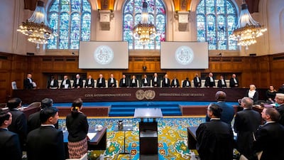 A handout photo released by the International Court of Justice shows a general view of The International Court of Justice (ICJ) holding a public hearing in the case concerning the Application of the Convention on the Prevention and Punishment of the Crime of Genocide (The Gambia v. Myanmar) at the Peace Palace in The Hague, with Myanmar's State Counsellor Aung San Suu Kyi (5thL) and Gambian politician and lawyer Abubacarr Marie Tambadou (4thR) attending. AFP