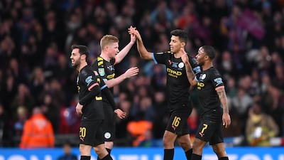Bernardo Silva, Kevin De Bruyne, Rodrigo and Raheem Sterling of Manchester City celebrate following victory in the League Cup final against Aston Villa at the Wembley Stadium in March. Getty Images
