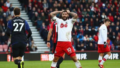 Charlie Austin of Southampton reacts during the Premier League match against Bournemouth. Clive Rose / Getty Images
