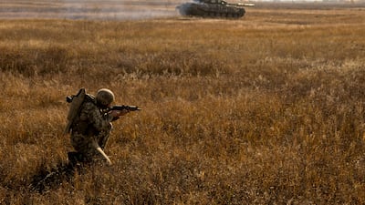 A soldier in the Ukrainian Armed Forces takes part in military drills near the border with Russian-annexed Crimea. Reuters