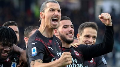 Zlatan Ibrahimovic celebrates with teammates after scoring for AC Milan against Cagliari. EPA
