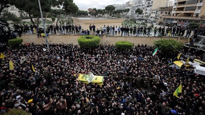 Mourners carry the coffin a Hezbollah fighter who was killed in Syria's northwestern Idlib region, during a funeral for him and four comrades in the southern suburb of Beirut, Lebanon. AP Photo