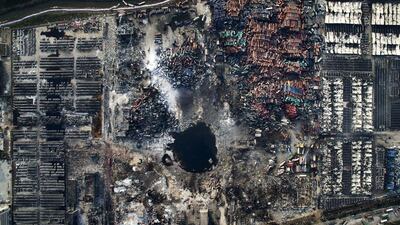 A handout image provided by the World Press Photo (WPP) organisation on 18 February 2016 shows a picture by Chinese photographer Chen Jie that won 3rd prize singles in the General News category of the 59th annual World Press Photo Contest, it was announced by the WPP Foundation in Amsterdam, The Netherlands on 18 February 2016. The picture shows an aerial view of the destruction after the explosion in Tianjin, China, 15 August 2015. Chen Jie / EPA
