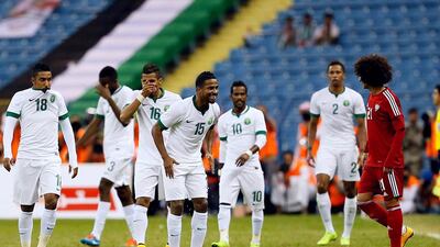 Nasser Al Shamrani (no 15) and his Saudi Arabia teammates have targeted Omar Abdulrahman, right, in the past and are expected to hand a rough treatment again. Courtesy Al Ittihad
