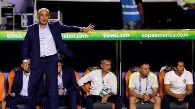 Brazil coach Tite shouts instructions from the sidelines. EPA