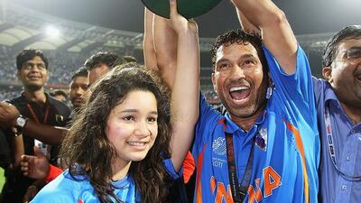 Sachin Tendulkar celebrates India's World Cup victory with his daughter Sara in Mumbai in 2011. Photo by Matthew Lewis / Getty Images