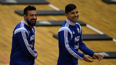 Ezequiel Lavezzi, left, of Paris Saint-Germain and Sergio Aguero of Manchester City during the training session for Argentina's friendly against Romania. Daniel Mihailescu / AFP