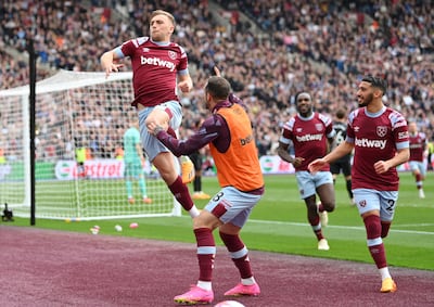 Jarrod Bowen of West Ham United celebrates with Danny Ings and teammates after scoring the Hammers' second goal. Getty Images