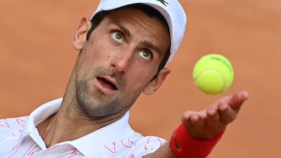 Serbia's Novak Djokovic serves to Germany's Dominik Koepfer at the Italian Open in Rome. AP