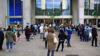Customers queue to enter a Galeria Karstadt Kaufhof GmbH department store as shopping without proof of a negative Covid-19 test result begins in Berlin, Germany. Chancellor Angela Merkel is ready to allow Germany’s controversial lockdown law to lapse, the latest sign that the pandemic is releasing its grip on Europe’s largest economy. Bloomberg