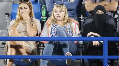 Spectators watch the match between Stan Wawrinka and Milos Raonic. Ali Haider / EPA