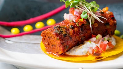 Seekh tacos – mince lamb spicy kebab, allspice, saffron flat bread, tzatziki, tomato salsa from Moksh.