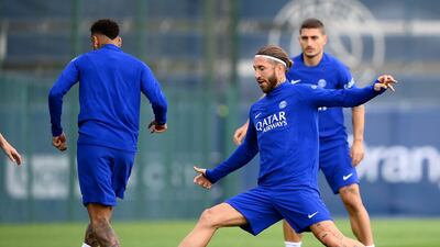 PSG defender Sergio Ramos challenges Neymar. AFP