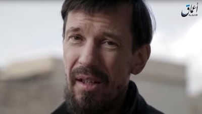A still from ISIS news agency Amaq showing captive British photojournalist John Cantlie in what appeared to be central Mosul, Iraq. Amaq via AP