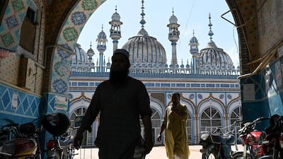 Pakistani Muslims leave the mosque in Rawalpindi ahead of the start of Ramadan. Muslims are preparing for Ramadan, which is calculated on the sighting of the new moon, and during which they fast from dawn until dusk. AFP