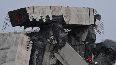 Rescuer workers are searching from survivors at scene of the collapsed bridge. EPA