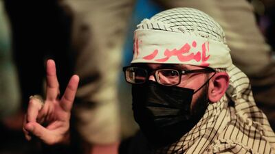 A peace gesture from a follower of Moqtada Al Sadr. Reuters