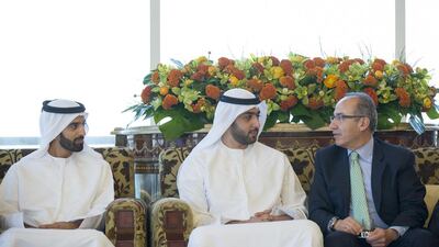 Sheikh Mohammed bin Saud bin Saqr, Crown Prince and Deputy Ruler of Ras Al Khaimah, left, Sheikh Rashid bin Saud bin Rashid Al Mualla, Crown Prince of Umm Al Quwain, second left, speak with Felipe Calderon Hinojosa. Ryan Carter / Crown Prince Court - Abu Dhabi