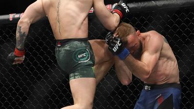 Conor McGregor lands a knee to the face of Donald Cerrone in their welterweight fight during UFC246 at the T-Mobile Arena, on Saturday, January 18. The Irish fighter won the bout after just 40 seconds of the first round in Las Vegas. AFP
