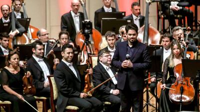 The orchestra left the Emirates Palace auditorium to a standing applause