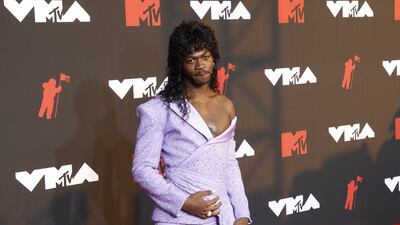 US rapper Lil Nas X, in custom Atelier Versace, arrives on the MTV Video Music Awards red carpet.
