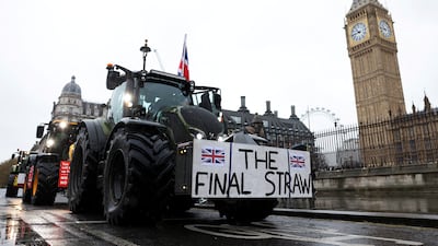 Protesters drive tractors through Westminster, central London, during a demonstration by farmers against the UK government's new agricultural policy. Reuters