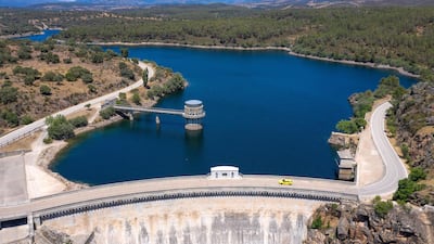 Crossing Madrid's El Atazar dam.