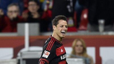Bayer Leverkusen’s Javier ‘Chicharito’ Hernandez celebrates after scoring against Wolfsburg in the Bundesliga on Friday night. Martin Meissner / AP / April 1, 2016