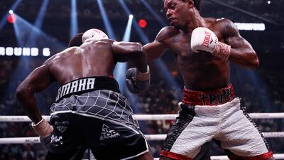 Errol Spence Jr, right, in action against Terence Crawford. EPA