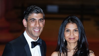 File photo dated 09/02/22 of Chancellor of the Exchequer Rishi Sunak alongside his wife Akshata Murty, as the Chancellor's family has been accused of "sheltering" itself from paying tax in the UK after it emerged his wife holds non-domiciled status. PA