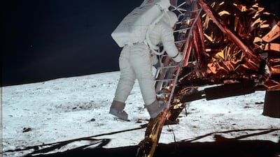 Aldrin descends a ladder from the Lunar Module during the Apollo 11 mission. NASA / AP