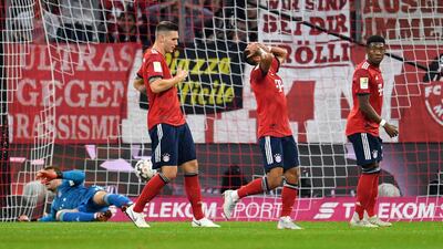 Bayern Munich's Manuel Neuer, Niklas Suele, Thiago and David Alaba, from left, react after Monchengladbach scored their second goal. AP Photo