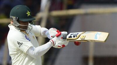 Pakistan cricketer Mohammad Hafeez plays a shot during the second day of the first Test against Bangladesh on Wednesday. Munir uz Zaman / AFP / April 29, 2015