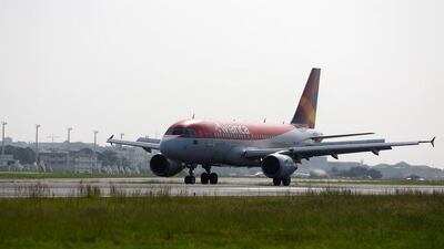 An Avianca jet lands at Santos Dumont Airport in Rio de Janeiro, Brazil. The carrier is one of five to have been approved for new Argentina routes. Ricardo Moraes / Reuters