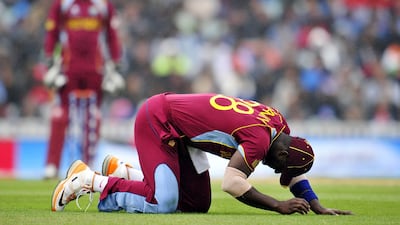 Another catch went down with Sammy the culprit this time. By then, it was all too late anyway as India cantered to an eight-wicket victory. Glyn Kirk / AFP