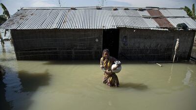 A total of 96 people have been killed in the flooding in the three states over the past week, according to state officials. Anupam Nath / AP Photo