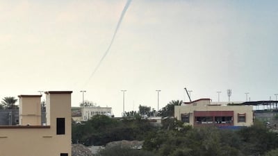 Emirati firefighter Rashid Al Shehhi took photos and video as the waterspout hovered over the coast about 1.15pm on Tuesday. Courtesy: Rashid Al Shehhi