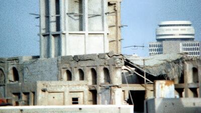 The wind towers of Bastakiya in Bur Dubai in the 1970s. The area has been renamed Al Fahidi in the years since. The distinctive curves and circular roof of Deira Tower can be seen on the right.