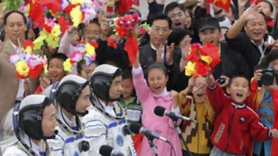 From left to right, Jing Haipeng, Zhai Zhigang and Liu Boming attend a ceremony before the launch of the Shenzhou 7 spacecraft yesterday.
