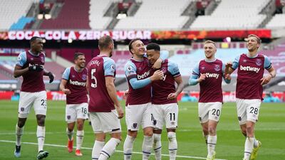 Jesse Lingard celebrates scoring the opening goal with his West Ham teammates. Reuters