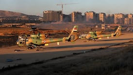 Military helicopters at Mezzeh Air Base after the Assad regime fell last year. Getty Images