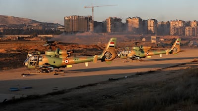 Military helicopters at Mezzeh Air Base after the Assad regime fell last year. Getty Images