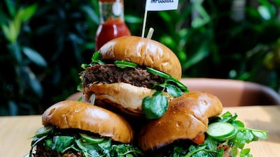 Even though they look like the real thing, Impossible Burgers contain no animal products. Courtesy of Impossible Foods