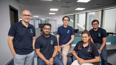 Founder Thawseef Jaleel, far right, with team members, from left, Nadeem Ulde, Arshaad Mohamed, Ferdinand Flores and Sadia Kazmi, who have been with Shyft since its inception. Antonie Robertson / The National