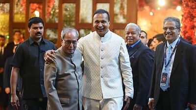 Former President of India and Indian businessman Anil Ambani attend the wedding. AFP