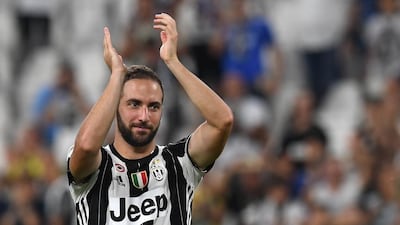 Gonzalo Higuain's arrival as the big-money replacement for Paul Pogba, has helped keep Juventus ahead of their title rivals. Valerio Pennicino / Getty Images