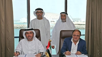 The signing of the construction contract for Jawaher Saadiyat. Courtesy TDIC
